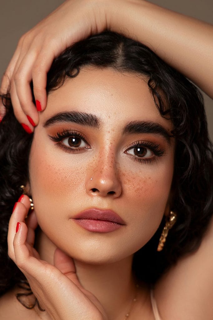 Close up of woman's face showcasing the full, youthful features desired from an autologous fat transfer by Dr. Randall in Morristown, NJ
