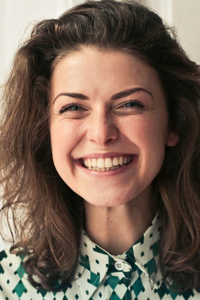 A beautiful woman smiles showcasing her beautiful, radiant skin- emulating possible outcomes of laser resurfacing by Dr. Randall in Morristown, NJ