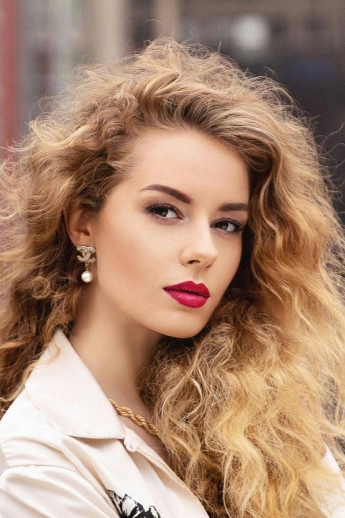 A beautiful woman, looking at the camera- creating an ideal for plastic surgery procedures by Dr. Randall in Morritown, NJ