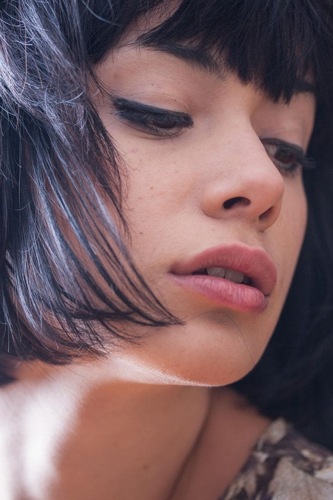 A woman with natural lips, with good volume, natural contours, and definition- emulating ideal results of a lip flip with Dr. Randall in Morristown, NJ